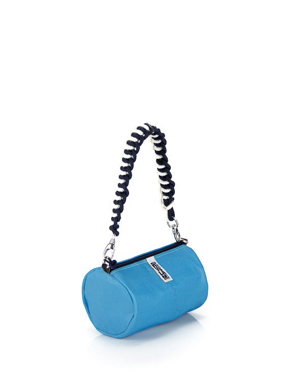 mini bag a mano colore turchese con manico intrecciato bianco e blu