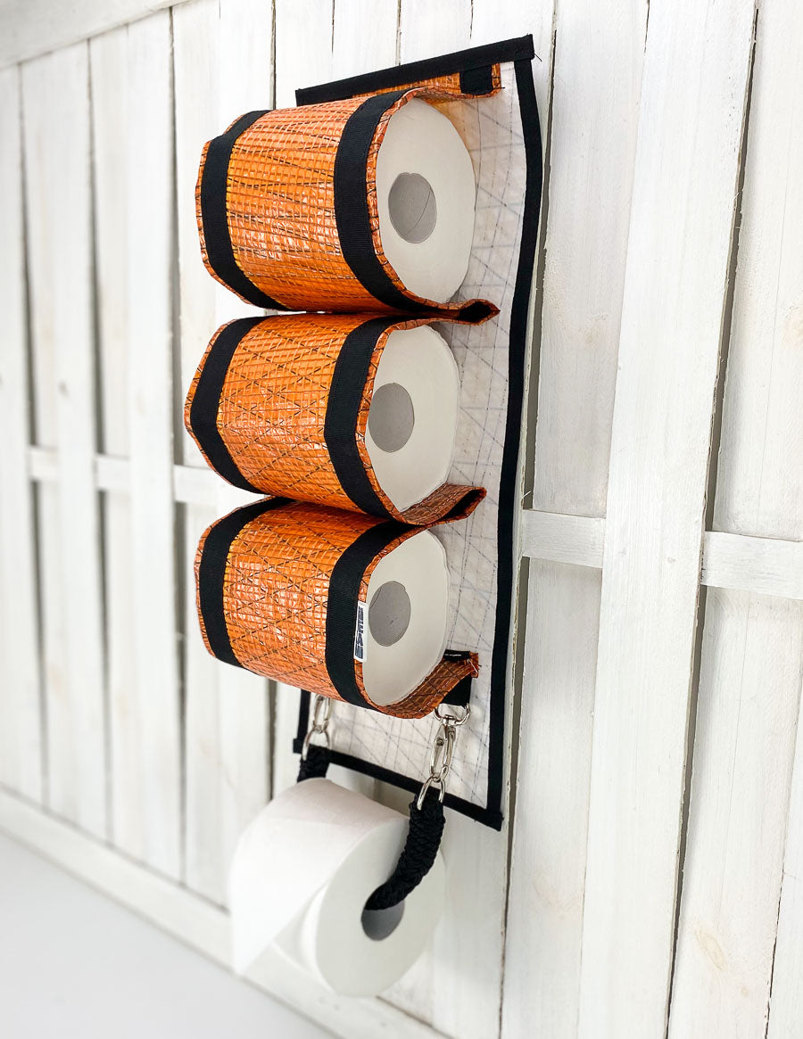 Rivelami | accessori bagno porta rotolo realizzato con vele riciclate arancioni
